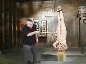 Tati Russo waxed, caned and manhandled in Bondage