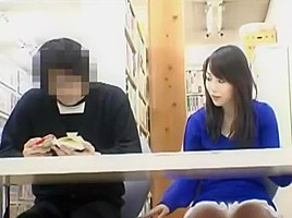 The girl seduced the man in the library