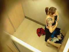 Topless tattooed asian babe caught by changing room