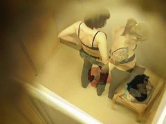Topless tattooed asian babe caught by changing room