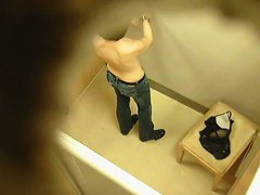 Topless tattooed asian babe caught by changing room