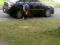 Totally woman peeing on cars