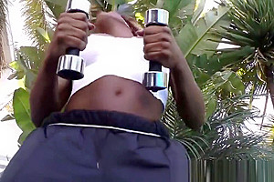 Toyed black tranny sucking hard cock outdoors
