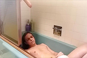 Trans girl pissed on by a a dildo