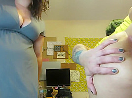 Two girls opening their asses to the camera