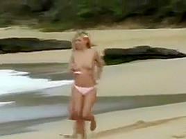 Two lesbians puts on a show for the boys on a beach!