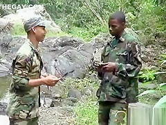 Two military lads resting by the river