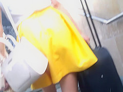 Upskirt in yellow skirt