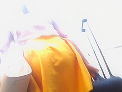 Upskirt in yellow skirt