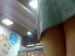 Upskirt at supermarket of Bubble ass beauty