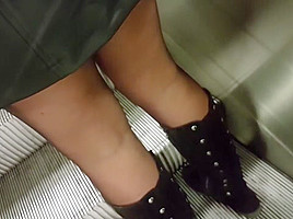 Upskirt in black pantyhose