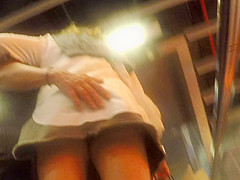 Upskirt of a MILF with hubby