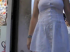 Upskirt of a girl holding hands with a guy