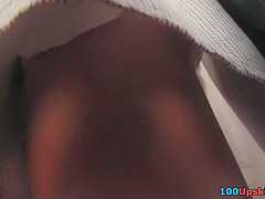 Upskirt porn with a flabby-ass gal in a public place