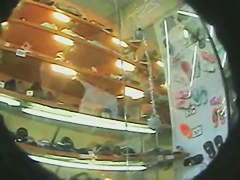 Upskirt shoe shopping brunette in a black dress and big round ass porno