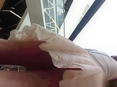 Upskirted in the shopping mall rolling stairs