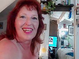 V100 Redheaded Cougar in panty parade and orgasm spectacular