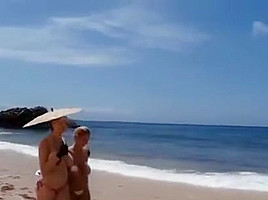 Westy and Shione topless beach walk