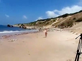 Westy and Shione topless beach walk