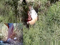 Woman caught pissing in the nature