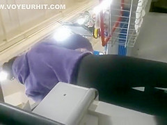 Woman in black leggings in supermarket