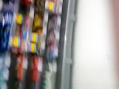 Woman in black leggings in supermarket