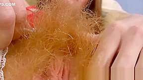 Zia loves being hairy and fingering her pussy