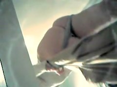 chick demonstrates her long legs and sexy panty