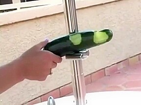 gigi plays with dildo