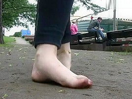 katya walking barefoot in public on a rainy day 3
