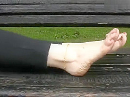 katya walking barefoot in public on a rainy day 3