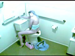 masturbation video with long haired gal cumming in toilet