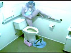 masturbation video with long haired gal cumming in toilet