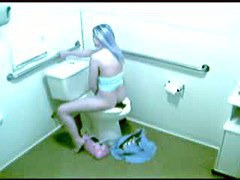 masturbation video with long haired gal cumming in toilet