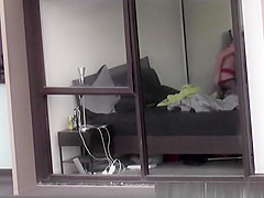 neighbor films apartment window