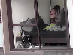 neighbor films apartment window