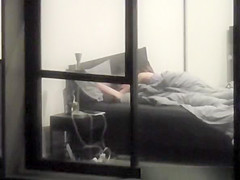 neighbor films apartment window