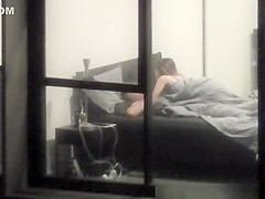 neighbor films apartment window