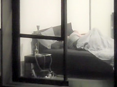 neighbor films apartment window