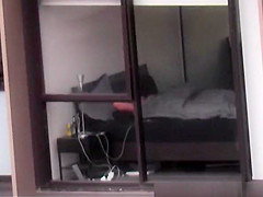 neighbor films apartment window