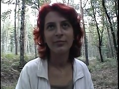 redhead wench receives exposed in the wood