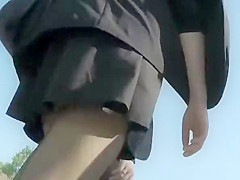 teen 18+ in short black skirt and black stockings upskirt