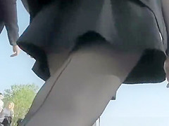 teen 18+ in short black skirt and black stockings upskirt
