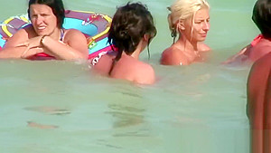 teens 18+ on the public beach topless showing naked firm breasts!